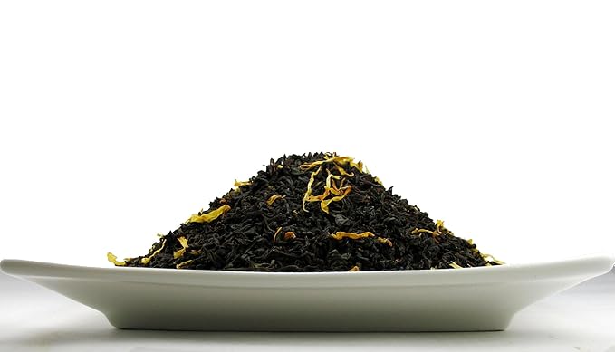 Organic Mango Tea, An Assam Black tea that has aromatic mango bits and natural flavours –2.80 OZ Tea Tin