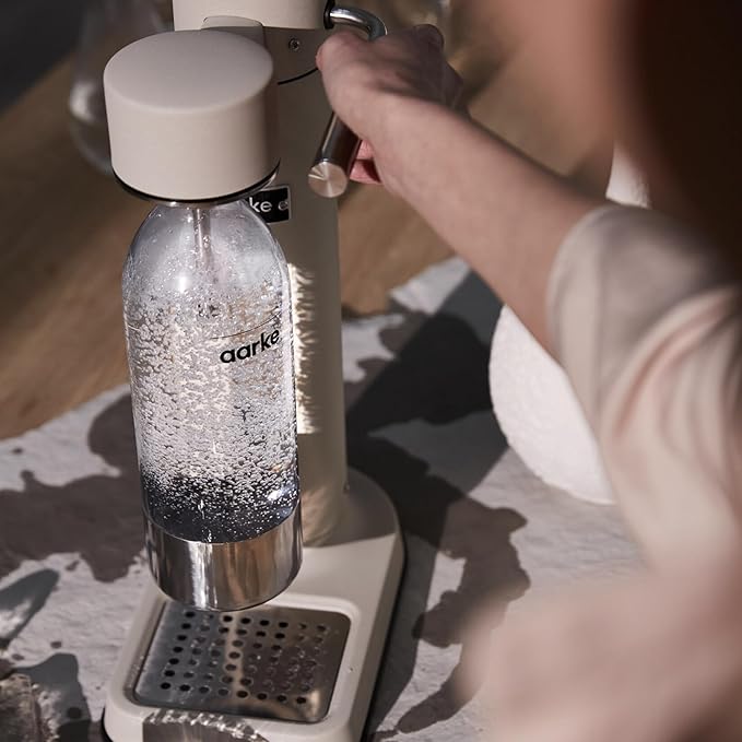 Aarke Carbonator lll with CO2 Cylinder, Sparkling & Carbonation Water Machine, Stainless Steel with PET BPA-Free Reusable Bottle Volume 1L/34 fl oz (Sand)